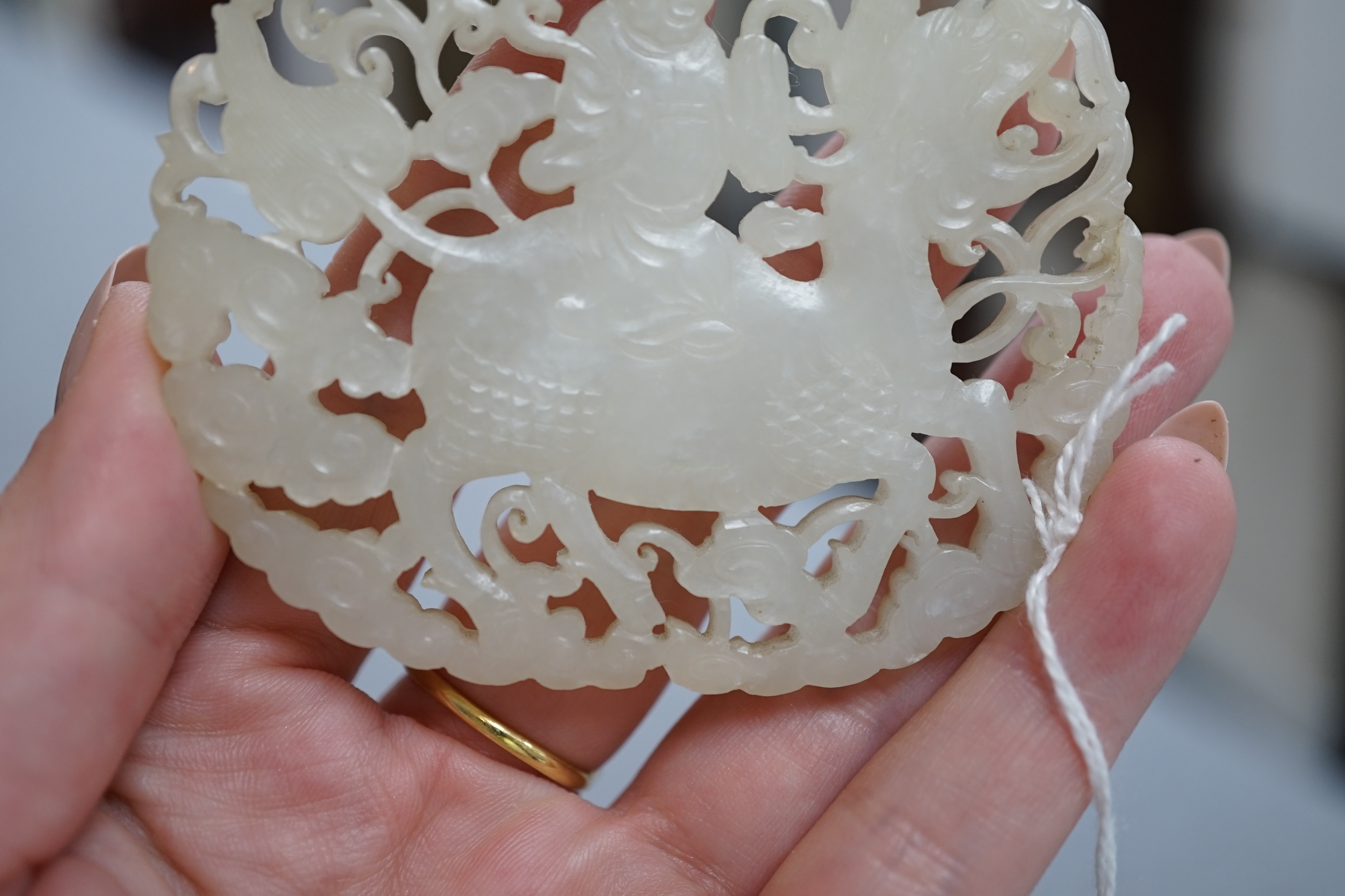 A Chinese white jade ‘qilin and rider’ plaque, 18th/19th century